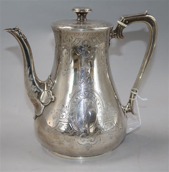 A Victorian silver coffee pot by William Hunter, gross 27 oz.